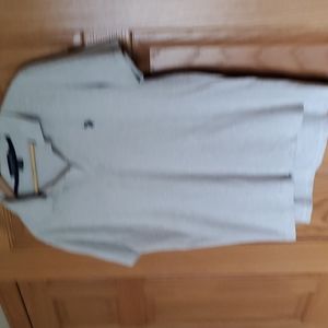 Men's tan polo shirt. Short sleeve cotton and viscose by U.S. Polo Assn.